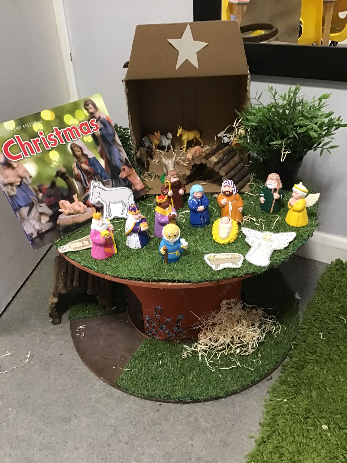 A small world nativity scene made by the children